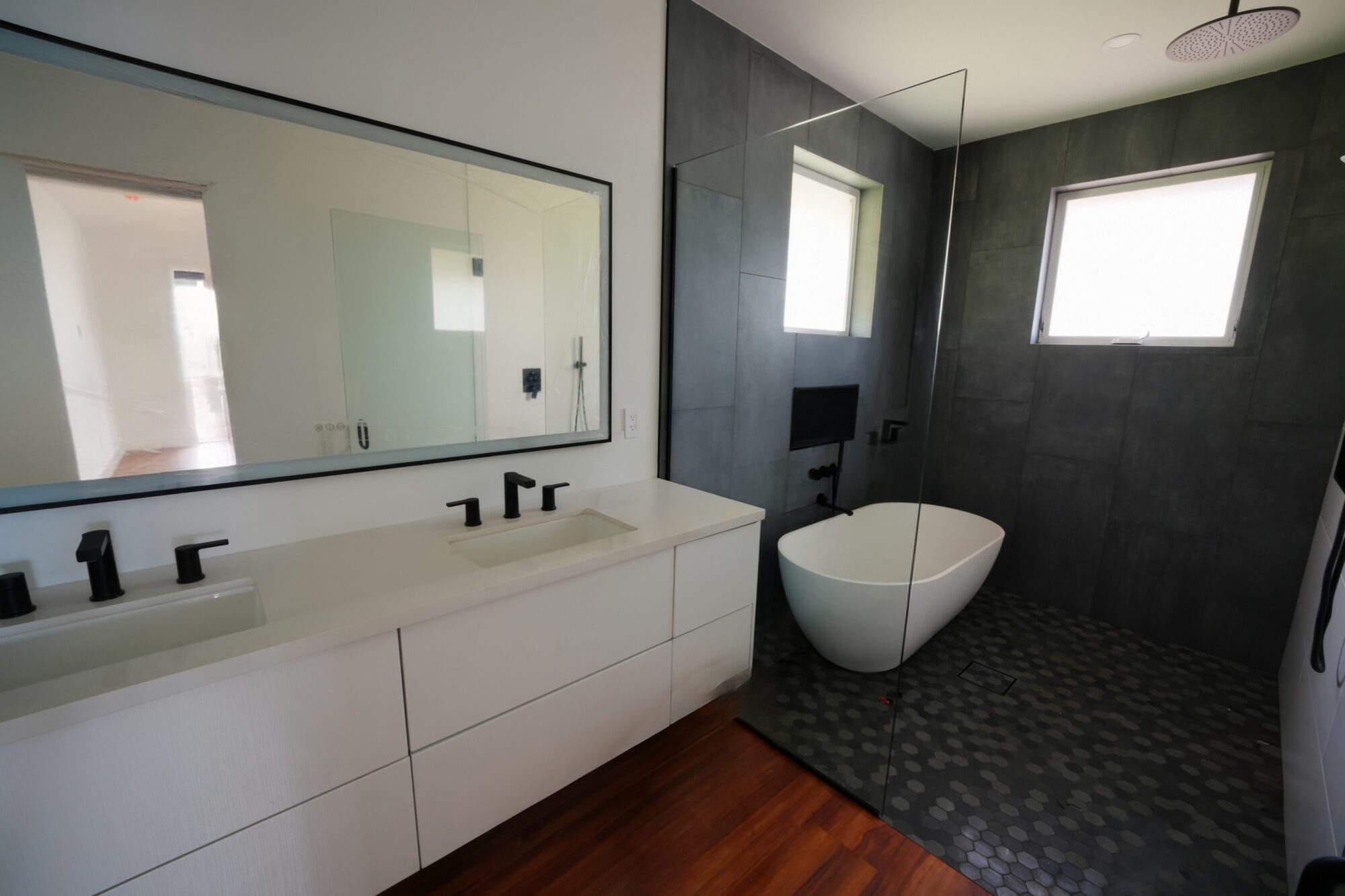 Master bath with pebble-tile shower floor