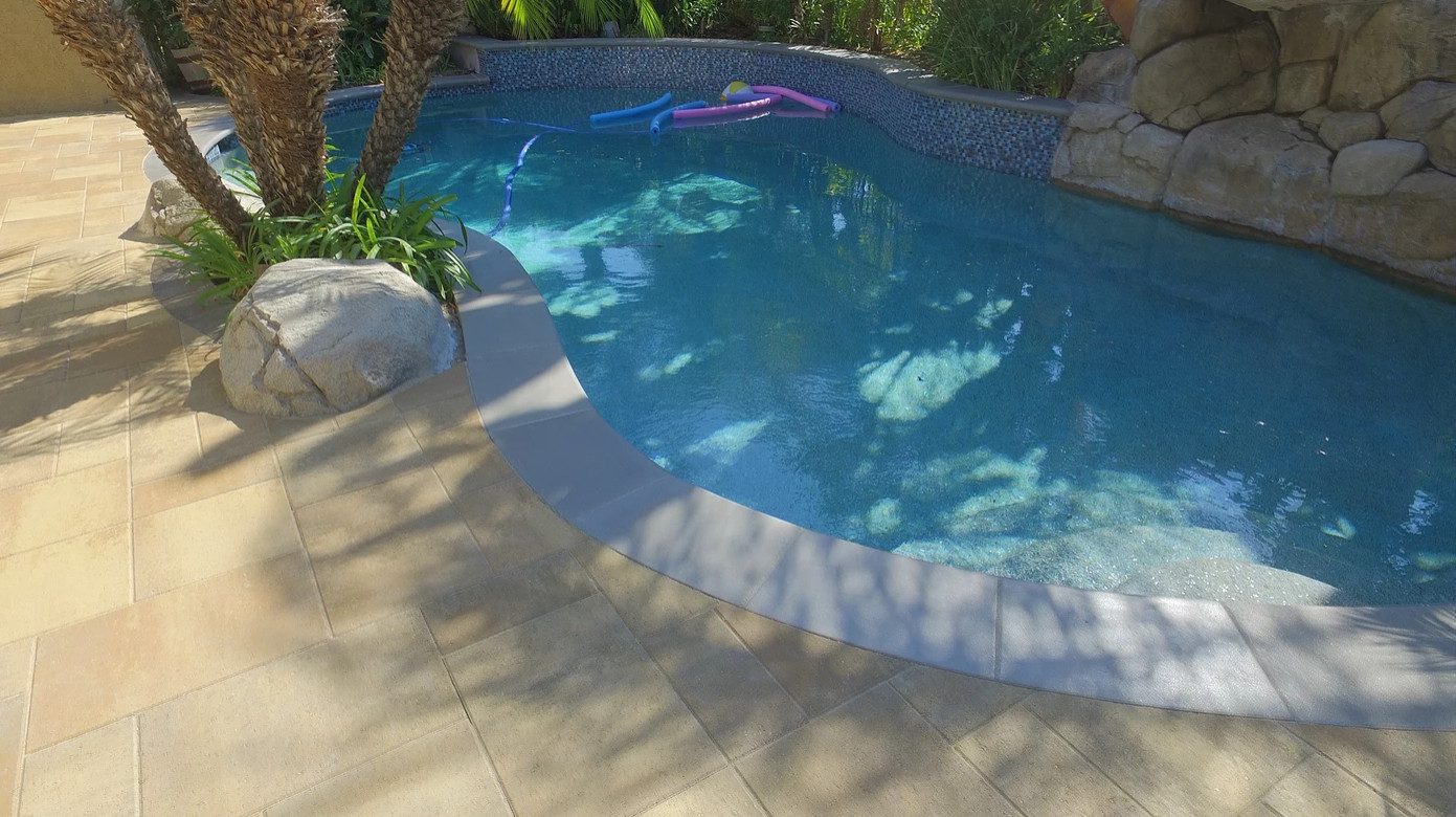 Pool edge with stone coping