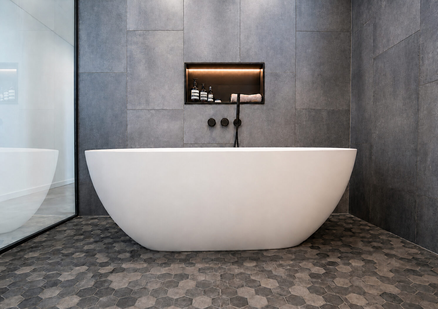 Soaking tub with stone surround