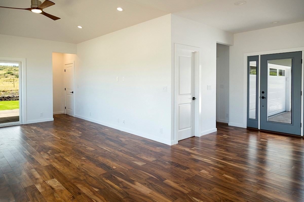 Bright bedroom with ceiling fan